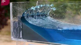 Wave tank demonstration showing the impact of coastal defences on flood risk [upl. by Baerman635]