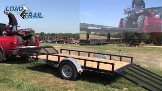 Loading ATVs on a Load Trail Single Axle Trailer with Front Ramp Gate and Rear Fold Gate [upl. by Nirtiac808]